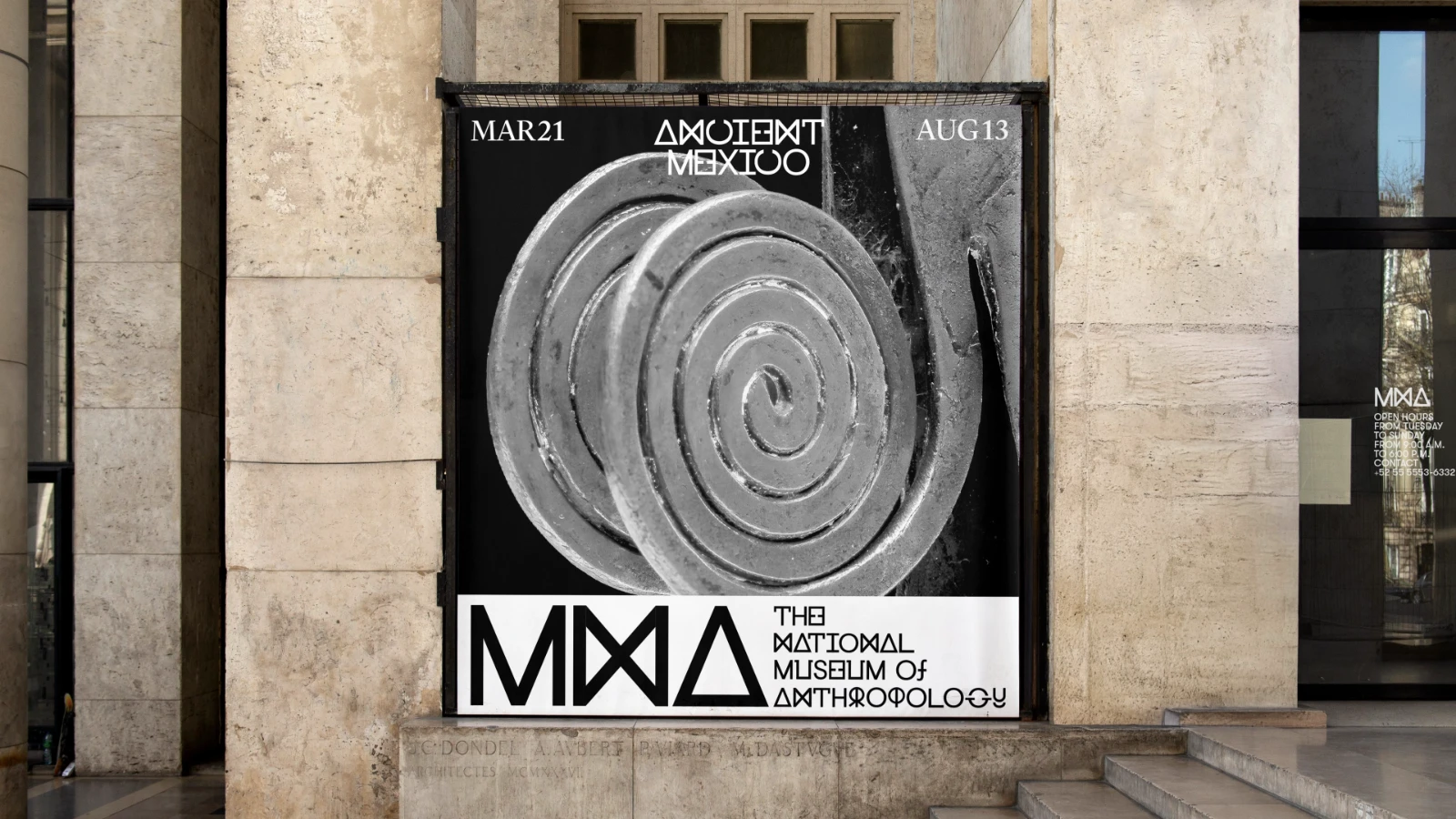 Exhibition billboard on brick wall